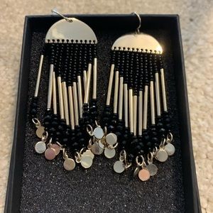 Gold and black dangle earrings